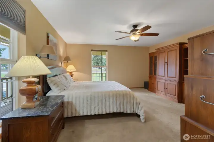 Primary bedroom on main floor. Custom built wall unit included. Walk-in closet, 5 piece bath
