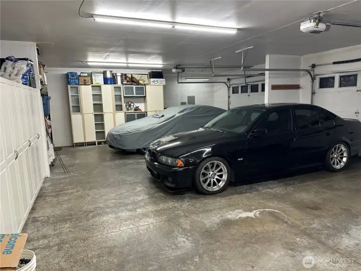 Interior 3 car garage with storage