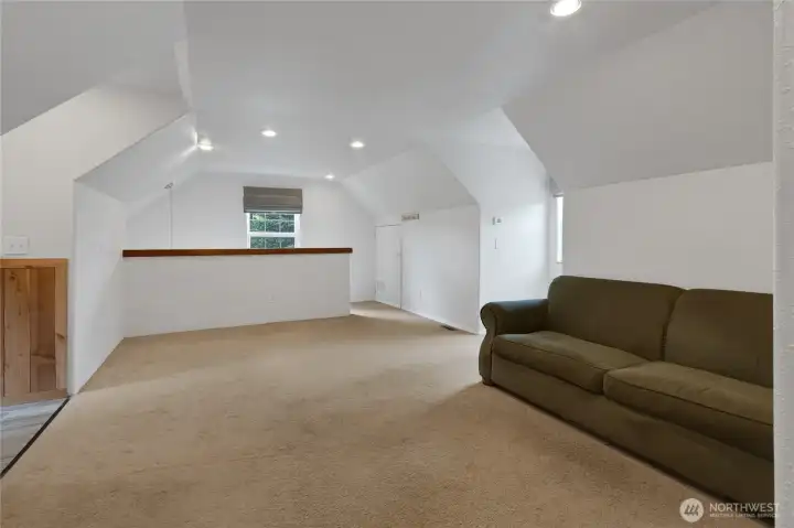 Bonus room above garage with dormers and 3/4 bath
