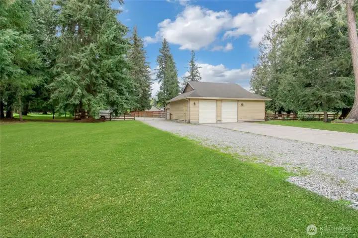 Detached 3 car with shop and bonus storage spaces.  Much more to see!