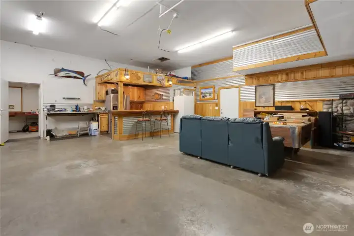 Detached garage with storage, built in bar area, pool table too.
