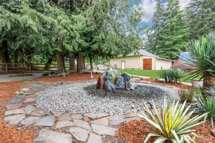 Custom rock water feature in back yard