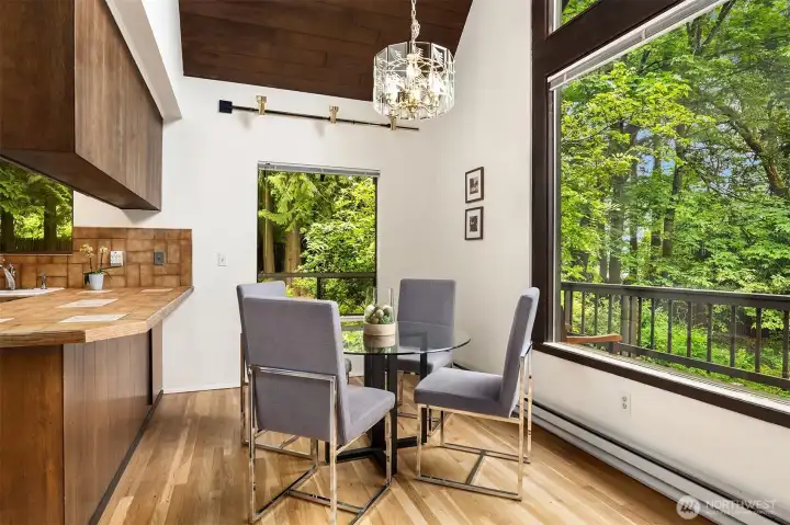 The kitchen counter, with room for bar seating, conveniently extends to dining area.
