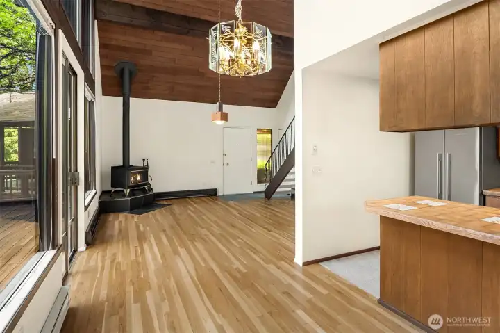 Kitchen counter conveniently extends to dining area.