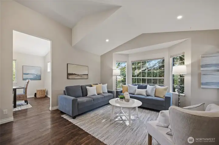 Lovely open floor plan with vaulted ceilings and plenty of natural light. Lovely open floor plan with vaulted ceilings and plenty of natural light.