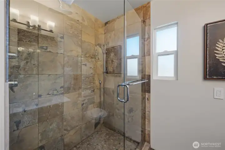 You will love this spa like shower in the primary bath. You will love this spa like shower in the primary bath.