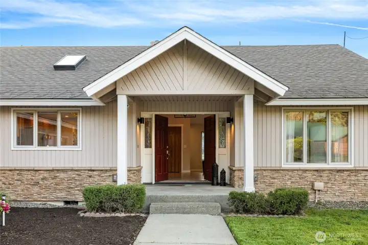 Come on inside! A grand double-door entry welcomes you into this special home.