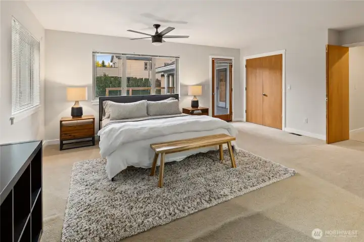 The primary suite enjoys direct access to the expansive deck, creating the perfect spot to savor your morning coffee while listening to the peaceful sounds of nature.