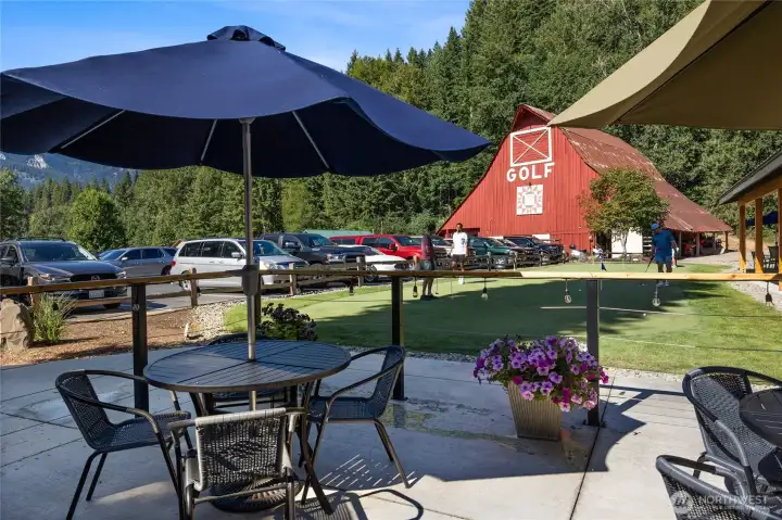 Enjoy a round at the beautiful Sun Country Golf Course. Pictured here is the practice putting green, conveniently located just outside the popular 9 Iron Bar & Grill.