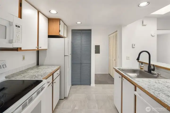 Kitchen with new microwave.