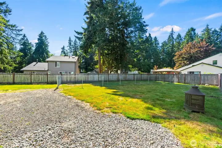 View from gate into backyard. View from gate into backyard.