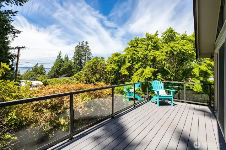 Enjoy the view of bay and sunsets on private deck area. Enjoy the view of bay and sunsets on private deck area.