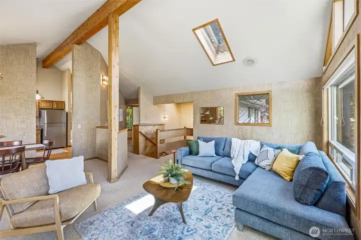 Main living area is open to dining room and kitchen. Main living area is open to dining room and kitchen.