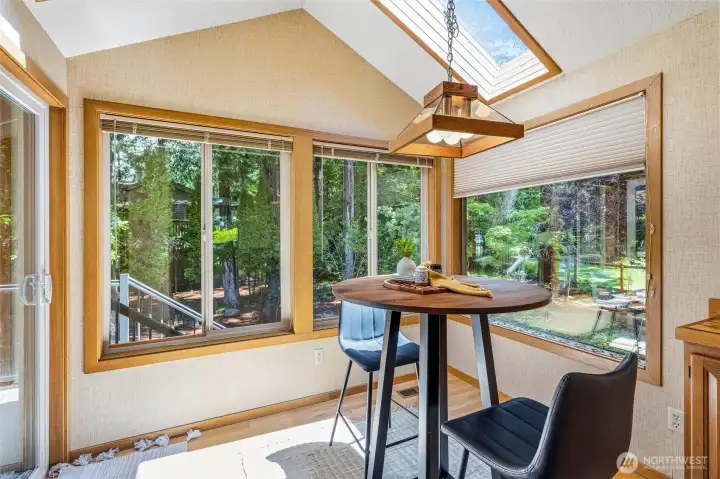 Dining nook is wonderfully designed space surrounded with windows and slider to back deck. Such a peaceful space to enjoy view of back yard. Dining nook is wonderfully designed space surrounded with windows and slider to back deck. Such a peaceful space to enjoy view of back yard.