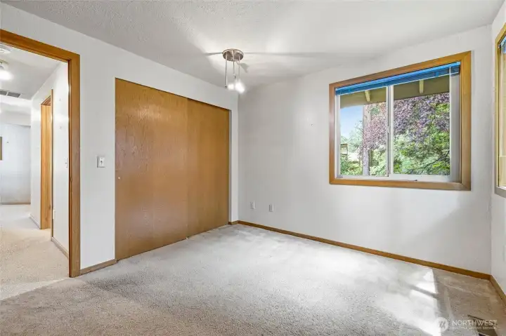 Upper-level secondary bedroom or excellent space for office. Upper-level secondary bedroom or excellent space for office.