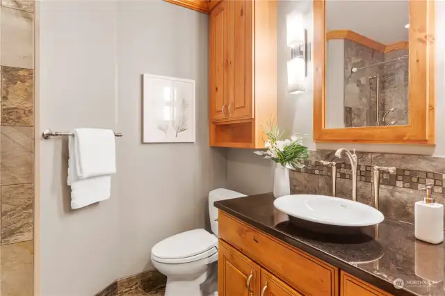 Guest bath, just outside the 3rd bedroom. Full bath with tub & shower, all wil elegant detail.