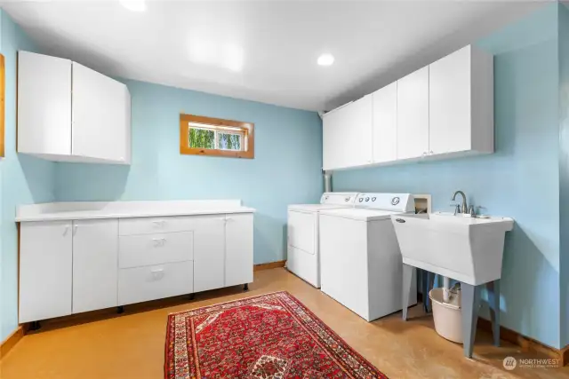 Large Laundry room and utility sink.