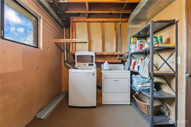 Laundry room located on lower level.  Plumbing is in place for a half bath to be added.