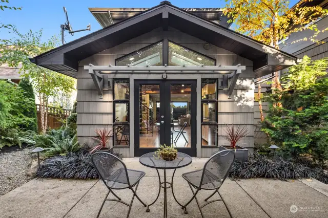 Lovely garden entry to the guest suite. Private back patio surrounded by a magical, colorful garden.