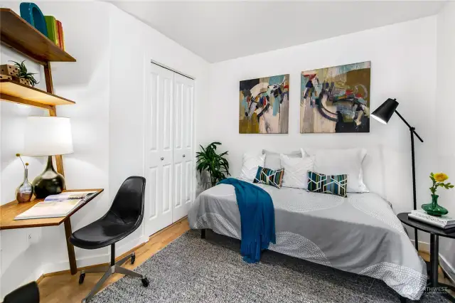 Two bedrooms with oversized windows and walk in closets are ideally positioned on opposite corners of the home for privacy —the owner’s suite with en suite bath and a second bedroom plus additional full bath.