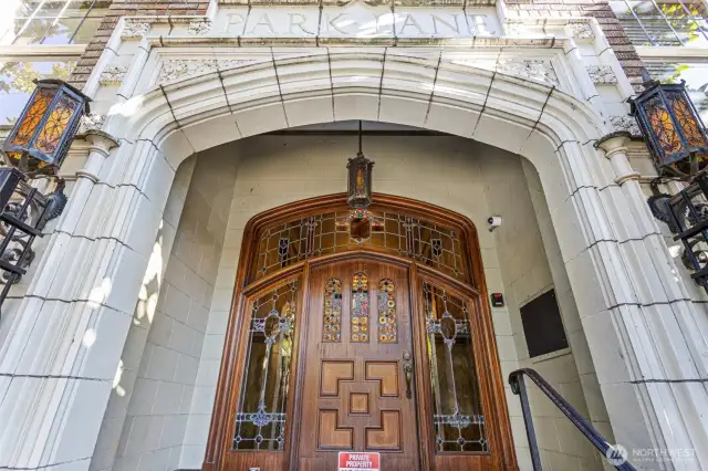 The grand arched entry of Park Lane Place radiates old-world charm and timeless grandeur, now complemented by a newly installed gated entry for added security and peace of mind.