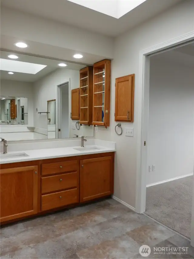 The skylight lets in natural light and brightens the entire room with that wonderful sun.