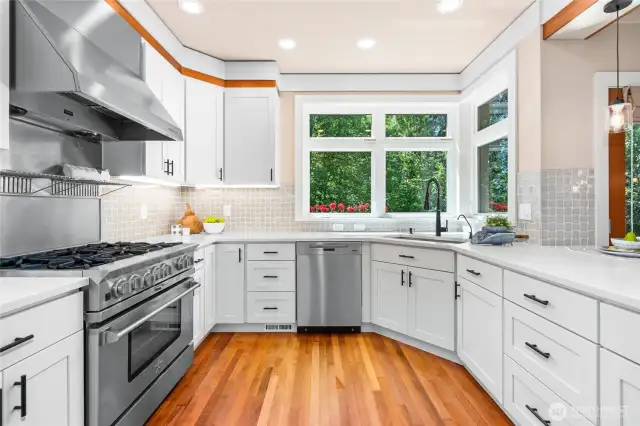 Stunning Quartz Counters in White Kitchen, 6 Burner Gas Range