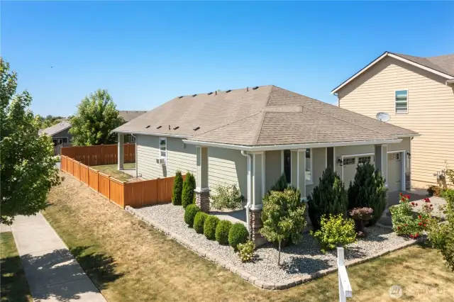 Corner Lot home with wrap around covered front porch!