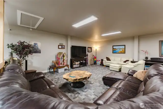 Endless potential—this spacious rec room loft is ready for hosting, hobbies, or whatever you dream up.