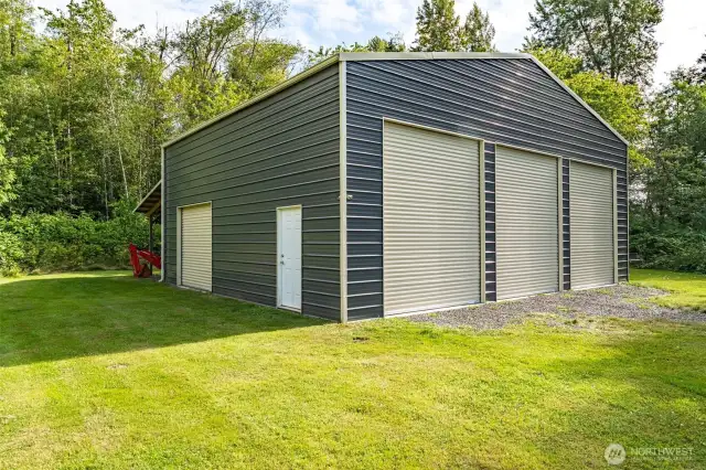 A second large shop with 12 foot RV doors provides plenty of space. This 39 x 32 foot shop is over 14 feet tall inside providing another source of income for RV storage or whatever you desire.