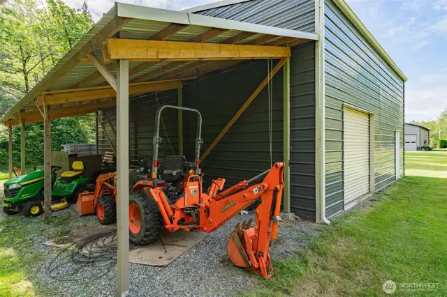 A lean to off the back of the shop is ideal for vehicles, tools, toys, or keeping equipment out of the weather.