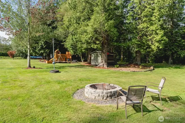 Gather under the stars—this cozy firepit area is perfect for relaxing evenings, s’mores, and memory-making moments.