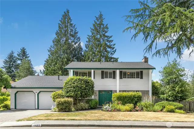 Welcome home! This house is proudly set on a large corner lot, and shows off its classical proportions elegantly!