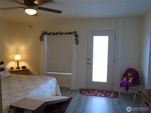 Primary Bedroom with Exterior door to Backyard