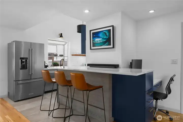 Kitchen and bar area on main floor