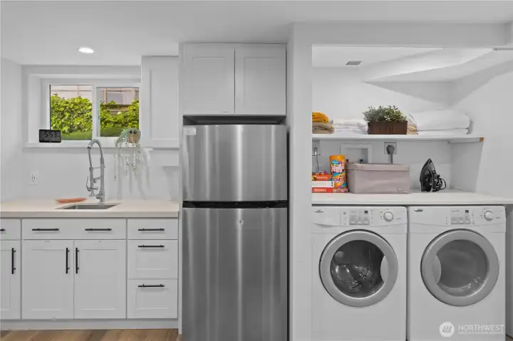 Lower level kitchenette and laundry area