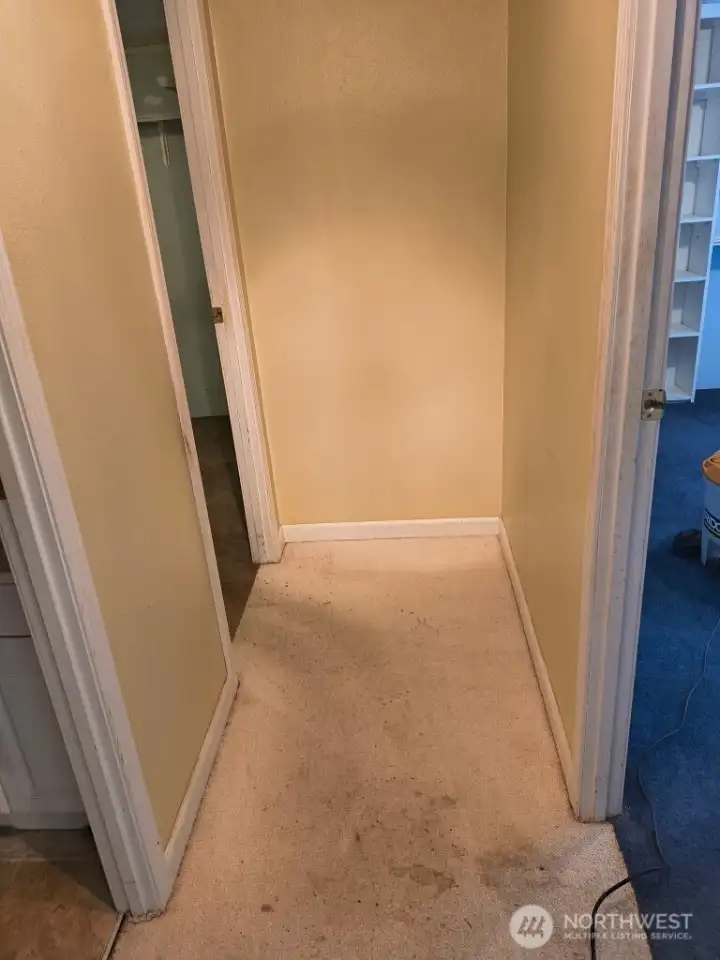 Hallway to the two other  large side bedrooms.