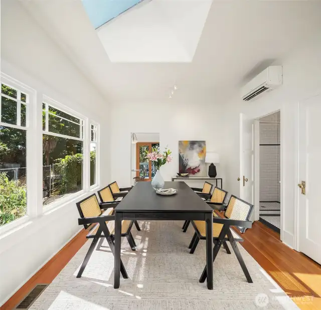A true dining room off the kitchen for larger gatherings or a romantic dinner for two. Note the dramatic skylight.