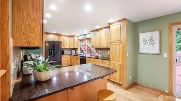 This expansive kitchen is ideal for gatherings, meal prep, and entertaining with ease.
