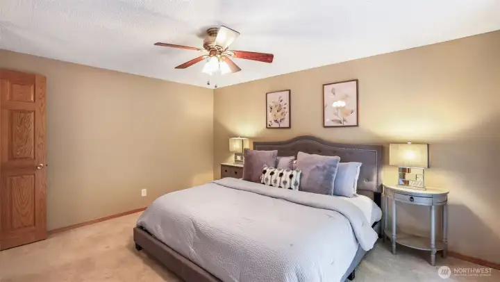 Ample storage awaits with a walk-in closet tucked inside this serene primary suite.