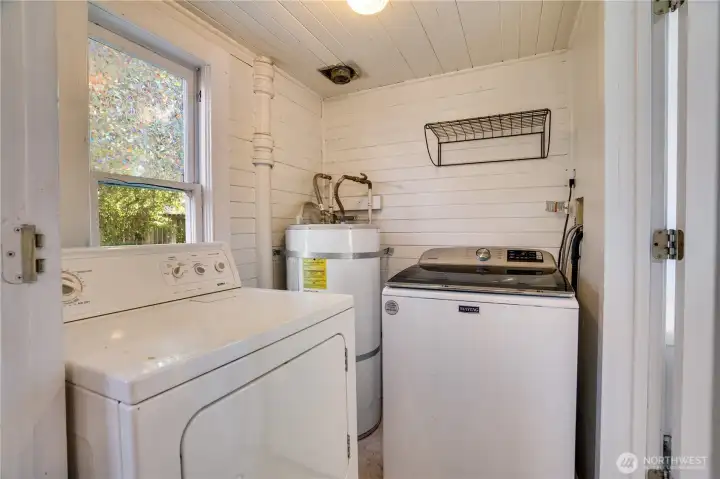 Laundry area off of kitchen and bathroom