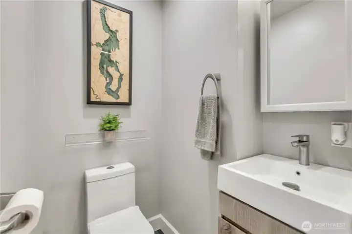 Updated half bath next to 4th bedroom