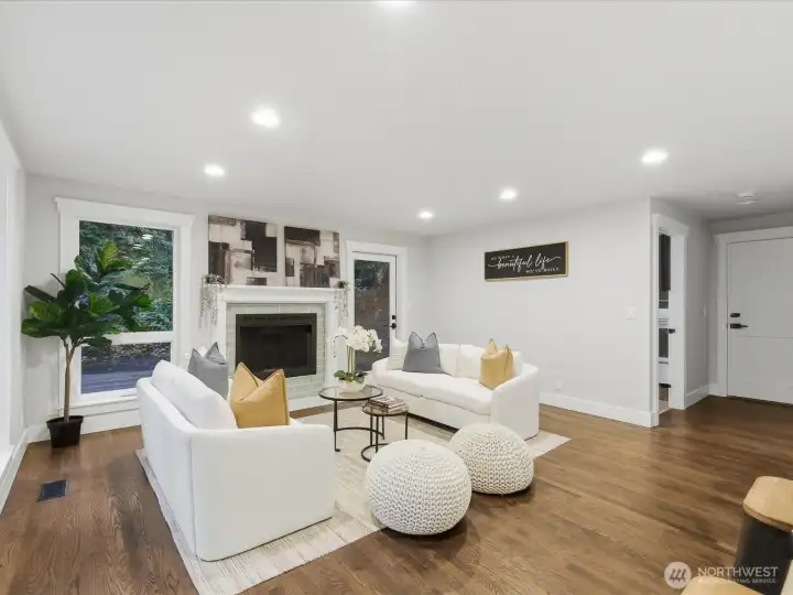 Living room off kitchen with cozy fireplace