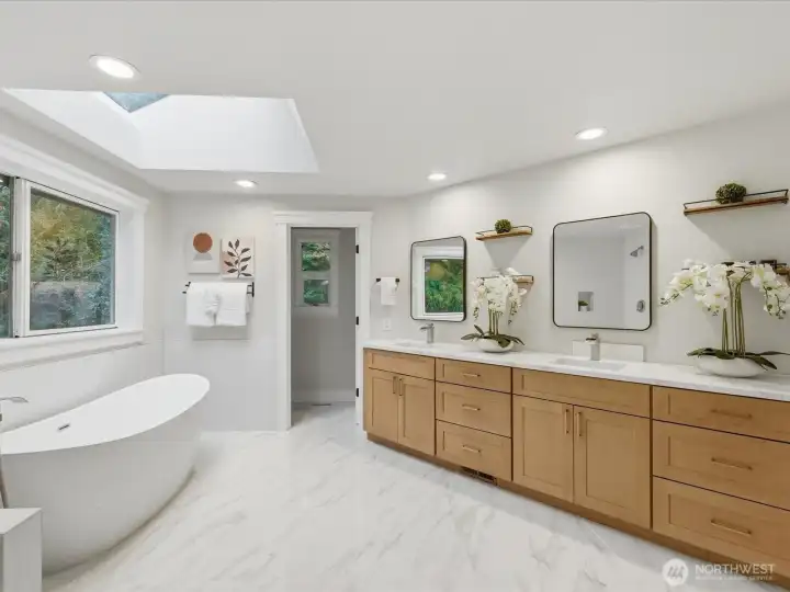 Generous sized Primary bath with custom vanity topped with 3CM quartz.