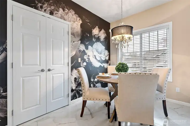 Dining Room. The double doors open to the pantry for extra storage
