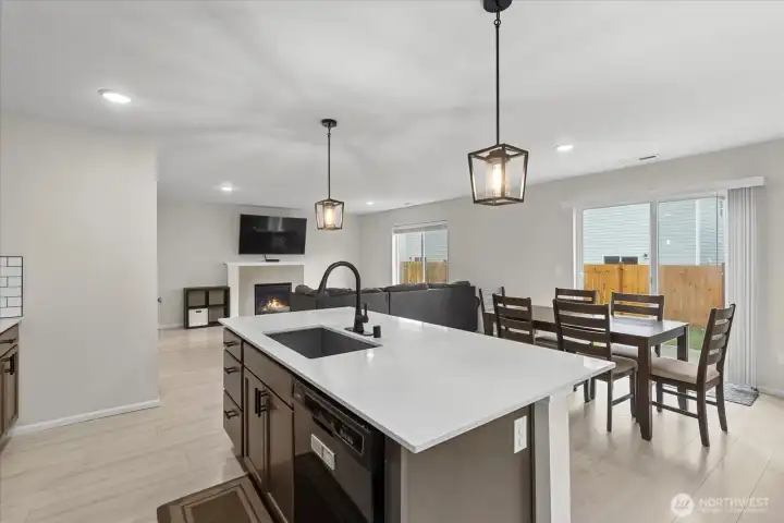 View looking into the dining area and great room from the kitchen.