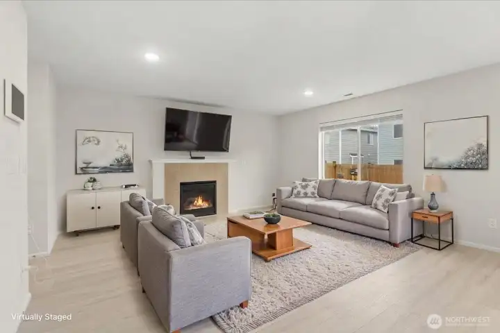 Great room featuring gas fireplace.