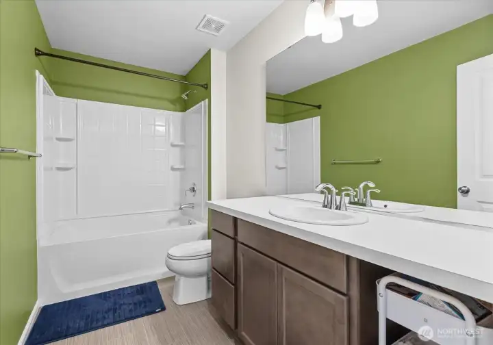 Full bathroom located on the upper level.