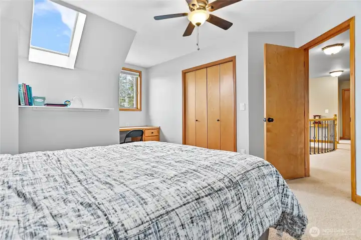 Bedroom next to owner's suite includes nice desk area, plenty of natural light & good size closet