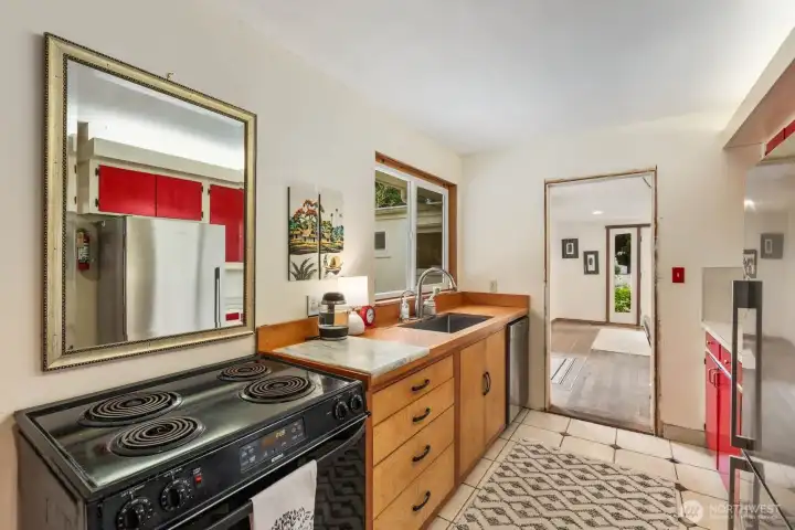 Franke SS sink, Miele dishwasher, washer and dryer to stay.